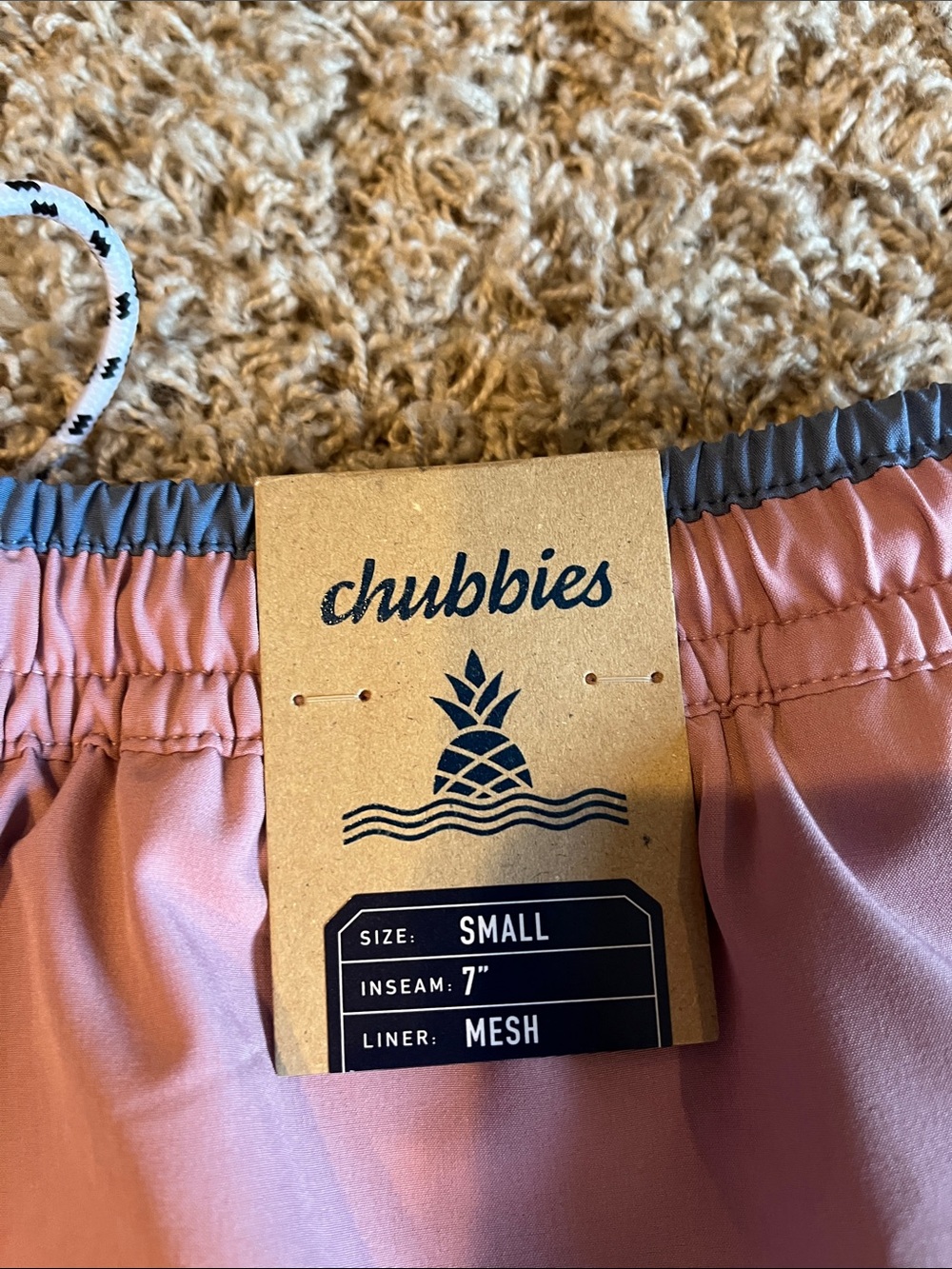 Chubbies men’s adult small swim trunks. Pink base with blue streak at the top. - Picture 3 of 5